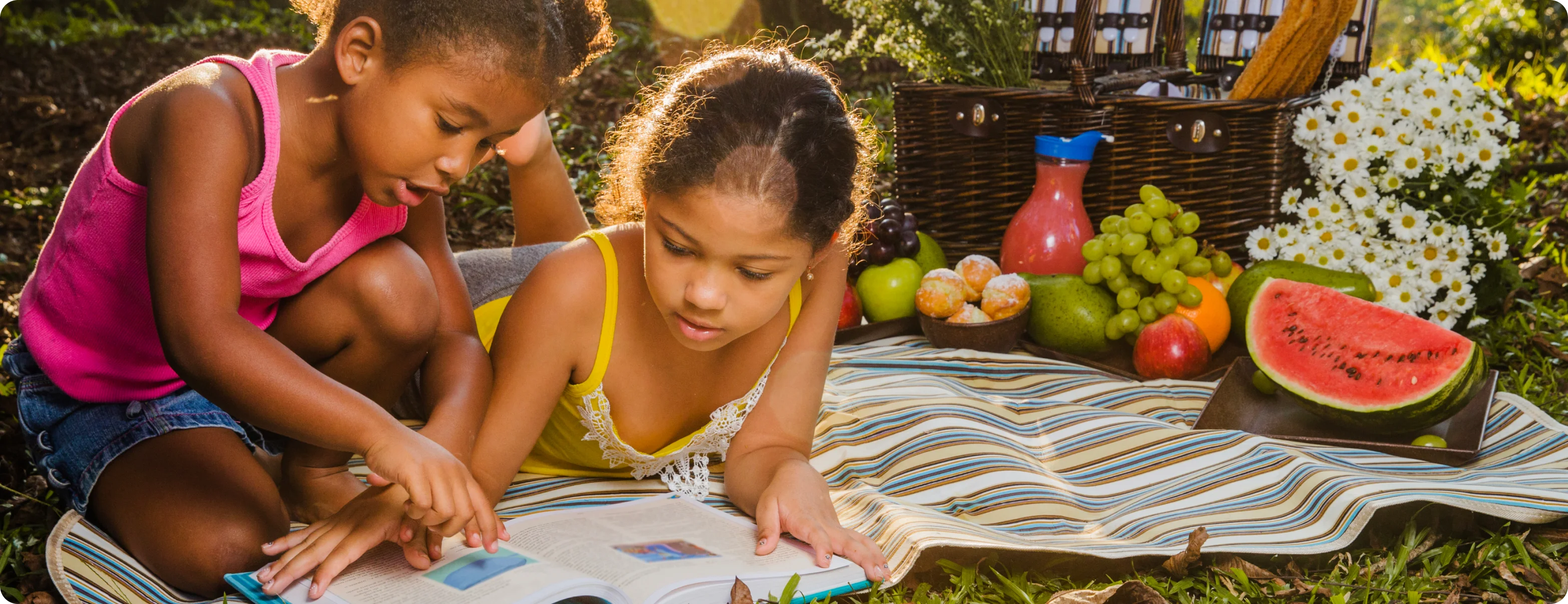 Children enjoying summer activities that enhance language and reading skills